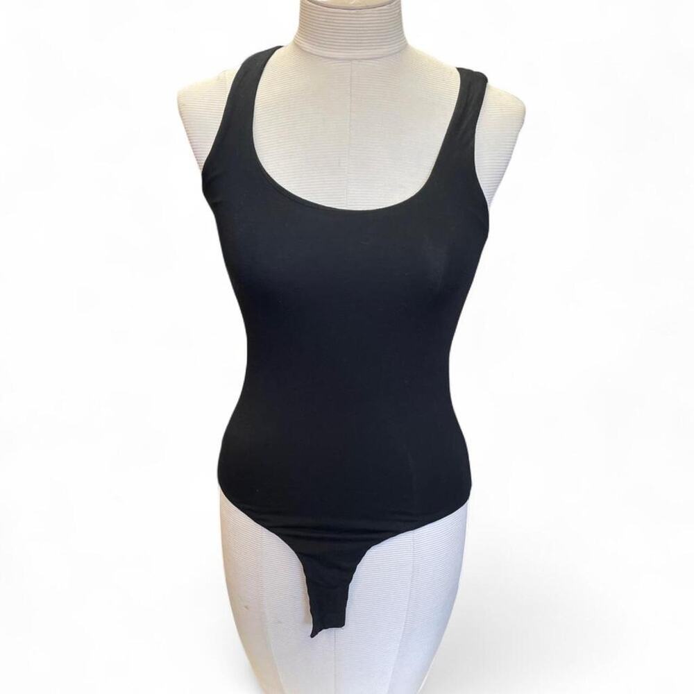 Black bodycon dress with cut